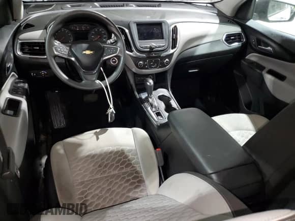 2021 Chevrolet Equinox LS z VIN 2GNAXHEV3M6157335, wystawiony jako Copart lot #61900995 z przebiegiem Nie podano mil oraz Szkoda całkowita • Salvage title. Historia ofert i sprzedaży dostępna na DreamBid. Obrazek 8.