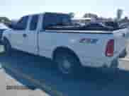 2004 Ford F-150 XL z VIN 2FTRX17W24CA14399, wystawiony jako IAAI lot #43305002 z przebiegiem 276 725 mil mil oraz . Historia ofert i sprzedaży dostępna na DreamBid. Obrazek 3.