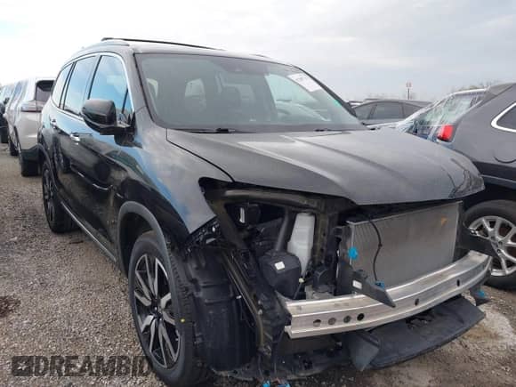 2020 Honda Pilot Touring 7-Passenger z VIN 5FNYF5H64LB000287, wystawiony jako IAAI lot #41288778 z przebiegiem 58 568 mil mil oraz . Historia ofert i sprzedaży dostępna na DreamBid. Obrazek 1.
