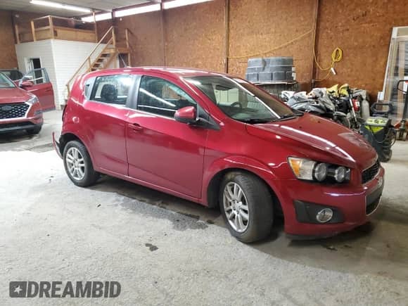 2013 Chevrolet Sonic LT with VIN 1G1JC6SG9D4159485, listed as a Copart auction lot 83822545 with 95,761 mi miles and Salvage title. Bid and sale history available at DreamBid. Image 4.