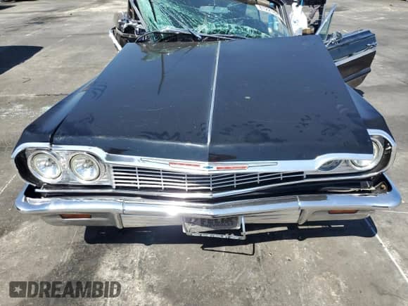 1964 Chevrolet Impala z VIN 41447F153380, wystawiony jako Copart lot #81221825 z przebiegiem 81 151 mil mil oraz Szkoda całkowita • Salvage title. Historia ofert i sprzedaży dostępna na DreamBid. Obrazek 11.