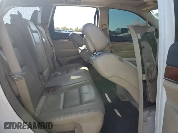 2012 Jeep Grand Cherokee Limited z VIN 1C4RJFBGXCC254576, wystawiony jako Copart lot #80382215 z przebiegiem 176 843 mil mil oraz Szkoda całkowita • Salvage title. Historia ofert i sprzedaży dostępna na DreamBid. Obrazek 11.