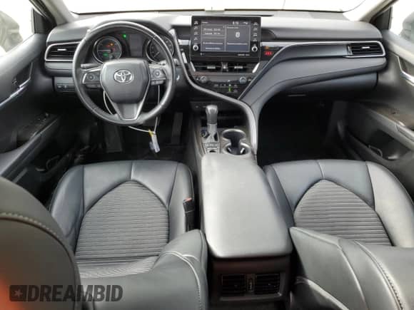 2023 Toyota Camry Hybrid SE with VIN 4T1S31AK0PU046562, listed as a Copart auction lot 69478395 with 84,935 mi miles and Salvage title. Bid and sale history available at DreamBid. Image 8.