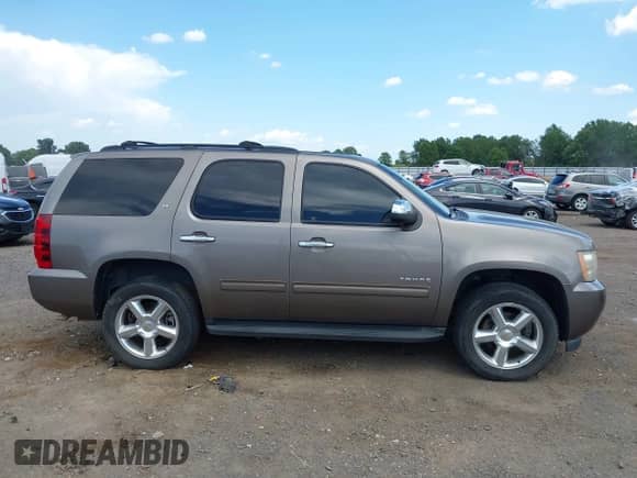 2011 Chevrolet Tahoe LT with VIN 1GNSCBE00BR397882, listed as a IAAI auction lot 42818583 with 191,303 mi miles and . Bid and sale history available at DreamBid. Image 13.