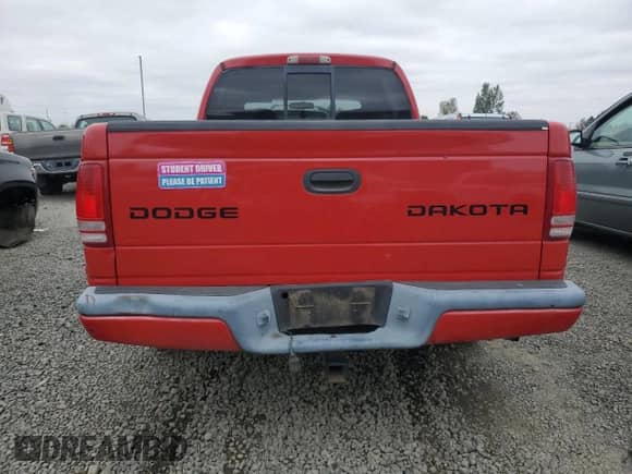 2004 Dodge Dakota Sport z VIN 1D7HL38N04S547877, wystawiony jako Copart lot #80321755 z przebiegiem 188 454 mil mil oraz Czysty tytuł • Clean title. Historia ofert i sprzedaży dostępna na DreamBid. Obrazek 6.