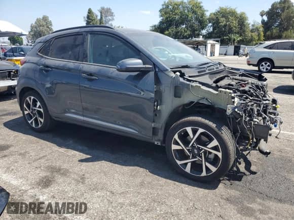 2022 Hyundai Kona Limited with VIN KM8K53A33NU820217, listed as a Copart auction lot 65589775 with 33,304 mi miles and Salvage title. Bid and sale history available at DreamBid. Image 4.