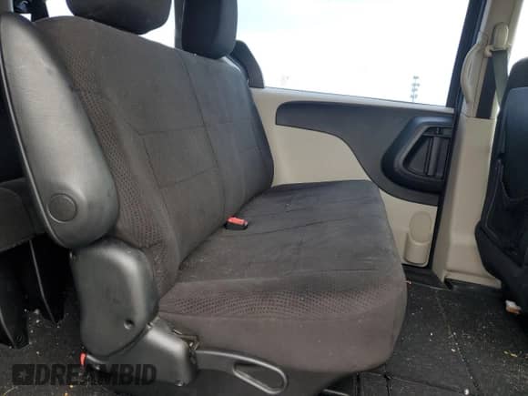 2013 Dodge Grand Caravan SE с VIN 2C4RDGBG4DR601308, выставлен на аукционе Copart как лот 86059425 с пробегом 99 657 миль миль и Списание • Salvage title. История ставок и продаж доступна на DreamBid. Изображение 11.