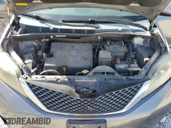 2013 Toyota Sienna SE with VIN 5TDXK3DC1DS298897, listed as a Copart auction lot 71516545 with 177,991 mi miles and Salvage title. Bid and sale history available at DreamBid. Image 12.