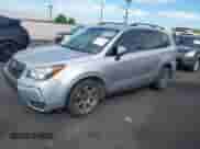 2014 Subaru Forester XT Premium z VIN JF2SJGDC9EH429943, wystawiony jako IAAI lot #43283448 z przebiegiem 122 106 mil mil oraz . Historia ofert i sprzedaży dostępna na DreamBid. Obrazek 6.