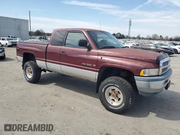 2000 Dodge 1500 with VIN 3B7HF12ZXYG129339, listed as a Copart auction lot 51156455 with 167,808 mi miles and Salvage title. Bid and sale history available at DreamBid. Image 4.
