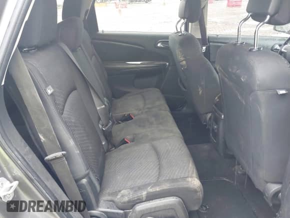 2012 Dodge Journey SE z VIN 3C4PDCAB9CT145811, wystawiony jako IAAI lot #42427991 z przebiegiem 174 416 mil mil oraz . Historia ofert i sprzedaży dostępna na DreamBid. Obrazek 8.