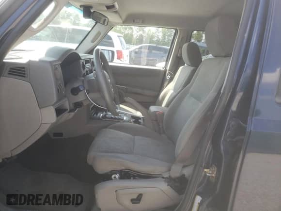 2006 Jeep Commander z VIN 1J8HH48K26C204923, wystawiony jako Copart lot #63748955 z przebiegiem 150 203 mil mil oraz Szkoda całkowita • Salvage title. Historia ofert i sprzedaży dostępna na DreamBid. Obrazek 7.