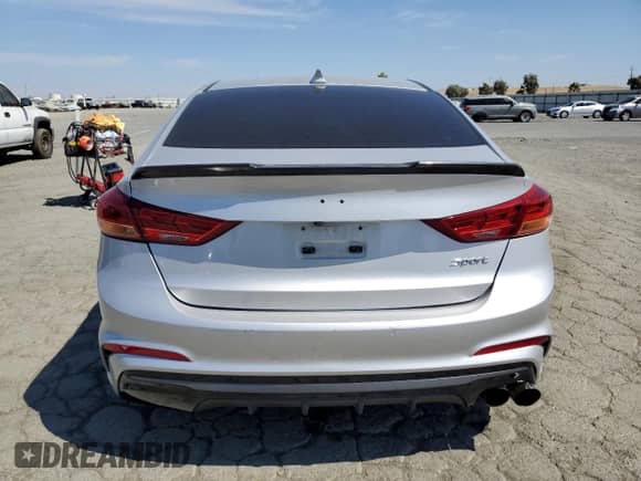 2018 Hyundai Elantra Sport с VIN KMHD04LB3JU703829, выставлен на аукционе Copart как лот 71507675 с пробегом 60 752 миль миль и Списание • Salvage title. История ставок и продаж доступна на DreamBid. Изображение 6.