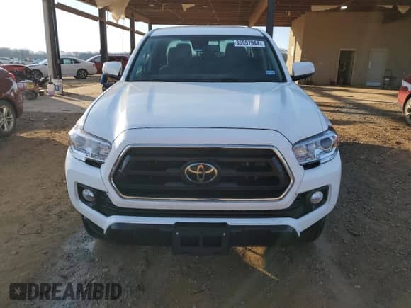 2022 Toyota Tacoma SR5 z VIN 3TMAZ5CNXNM193373, wystawiony jako Copart lot #85957944 z przebiegiem 21 134 mil mil oraz Szkoda całkowita • Salvage title. Historia ofert i sprzedaży dostępna na DreamBid. Obrazek 5.