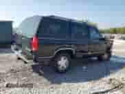 1996 Chevrolet Tahoe с VIN 1GNEK13R3TJ378433, выставлен на аукционе Copart как лот 69124565 с пробегом 331 337 миль миль и Списание • Salvage title. История ставок и продаж доступна на DreamBid. Изображение 3.