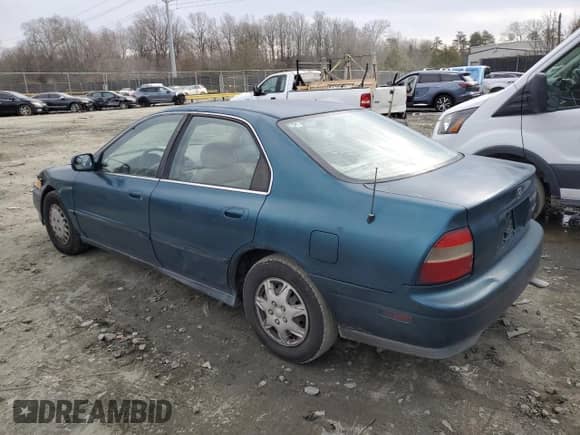 1994 Honda Accord with VIN 1HGCD5646RA119110, listed as a Copart auction lot 45968135 with 139,833 mi miles and Salvage title. Bid and sale history available at DreamBid. Image 2.