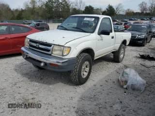 1998 Toyota Tacoma z VIN 4TAPM62N4WZ117725, wystawiony jako Copart lot #51313955 z przebiegiem 487 432 mil mil oraz Szkoda całkowita • Salvage title. Historia ofert i sprzedaży dostępna na DreamBid. Obrazek 1.