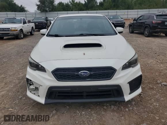 2020 Subaru WRX Premium with VIN JF1VA1C62L9814875, listed as a Copart auction lot 70986585 with 76,047 mi miles and Salvage title. Bid and sale history available at DreamBid. Image 5.