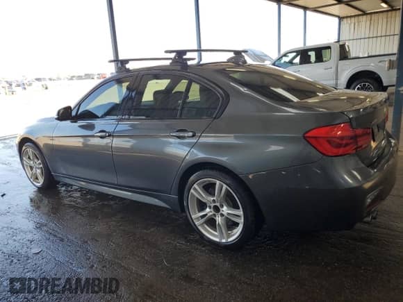2017 BMW 3 Series 330i xDrive with VIN WBA8D9C59HK677824, listed as a Copart auction lot 68756925 with 145,391 mi miles and Clean title. Bid and sale history available at DreamBid. Image 2.