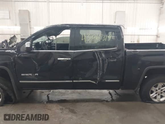 2017 GMC Sierra 1500 SLT with VIN 3GTU2NEC6HG102079, listed as a IAAI auction lot 43069314 with Not provided miles and . Bid and sale history available at DreamBid. Image 14.