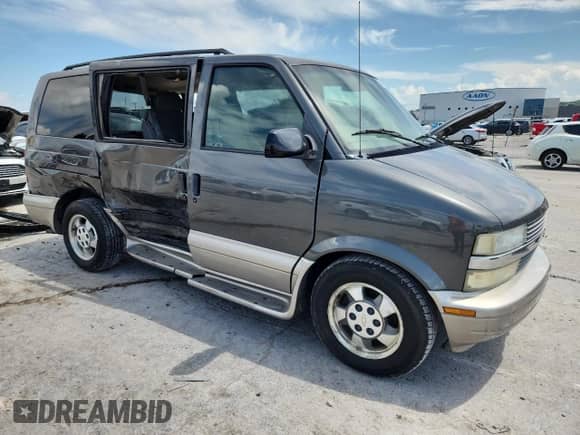 2003 Chevrolet Astro с VIN 1GNDM19X03B131473, выставлен на аукционе Copart как лот 64868565 с пробегом 107 042 миль миль и Списание • Salvage title. История ставок и продаж доступна на DreamBid. Изображение 4.