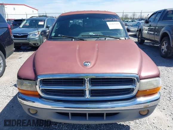 2000 Dodge Dakota Sport with VIN 1B7GL2AX7YS677544, listed as a IAAI auction lot 41965480 with 236,552 mi miles and . Bid and sale history available at DreamBid. Image 6.