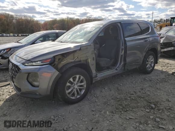 2019 Hyundai Santa Fe SEL Plus с VIN 5NMS3CAD3KH136001, выставлен на аукционе Copart как лот 52650095 с пробегом 74 469 миль миль и Списание • Salvage title. История ставок и продаж доступна на DreamBid. Изображение 1.