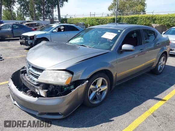 2012 Dodge Avenger SXT Plus with VIN 1C3CDZEG6CN325811, listed as a IAAI auction lot 43247091 with 200,293 mi miles and . Bid and sale history available at DreamBid. Image 2.