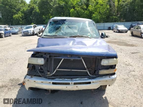 2001 Chevrolet Silverado 1500 with VIN 1GCEK14V01E166230, listed as a Copart auction lot 63446824 with 150,103 mi miles and Salvage title. Bid and sale history available at DreamBid. Image 5.