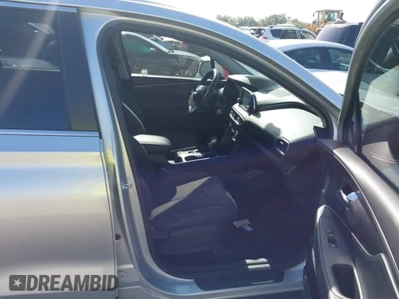 2019 Hyundai Santa Fe SE with VIN 5NMS23AD0KH011198, listed as a IAAI auction lot 42872650 with 113,071 mi miles and . Bid and sale history available at DreamBid. Image 5.
