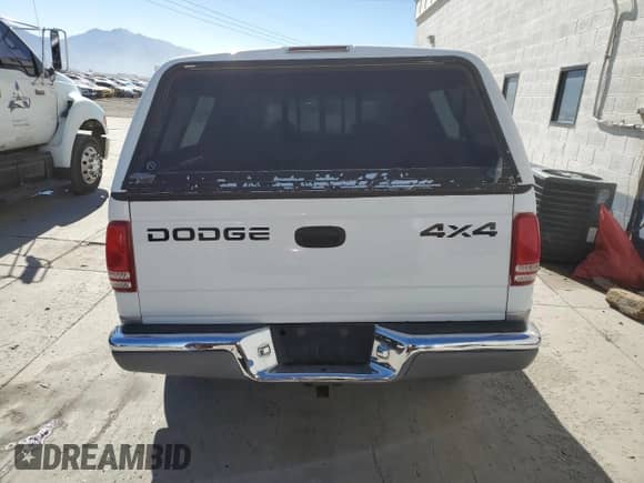 2000 Dodge Dakota Sport with VIN 1B7GG2AN1YS756470, listed as a Copart auction lot 84053895 with 164,167 mi miles and Salvage title. Bid and sale history available at DreamBid. Image 6.
