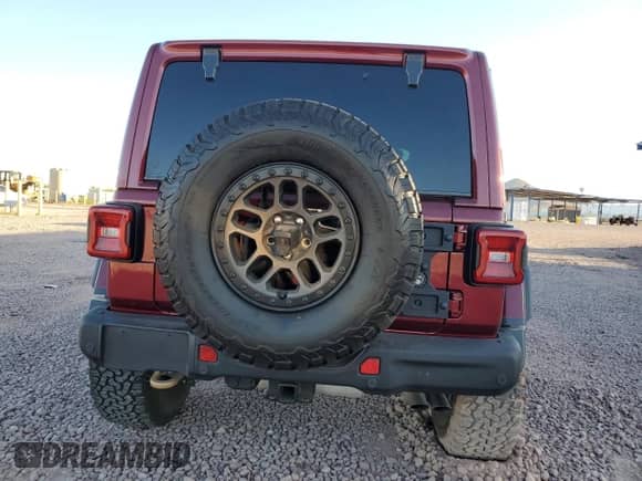 2022 Jeep Wrangler Unlimited Rubicon 392 with VIN 1C4JJXSJ4NW109209, listed as a Copart auction lot 58205345 with 29,433 mi miles and Salvage title. Bid and sale history available at DreamBid. Image 6.
