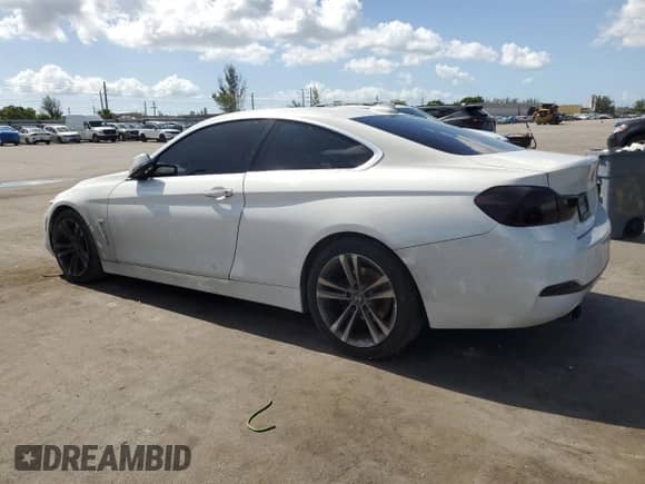 2019 BMW 4 Series 430i with VIN WBA4W3C54KAF93240, listed as a Copart auction lot 66692785 with 66,410 mi miles and Salvage title. Bid and sale history available at DreamBid. Image 2.