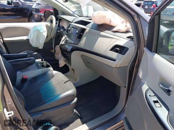2012 Toyota Sienna SE with VIN 5TDXK3DC5CS232979, listed as a IAAI auction lot 43136504 with 198,231 mi miles and . Bid and sale history available at DreamBid. Image 5.