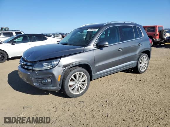 2014 Volkswagen Tiguan SEL z VIN WVGAV3AX0EW555873, wystawiony jako Copart lot #55695955 z przebiegiem 69 984 mil mil oraz Szkoda całkowita • Salvage title. Historia ofert i sprzedaży dostępna na DreamBid. Obrazek 1.