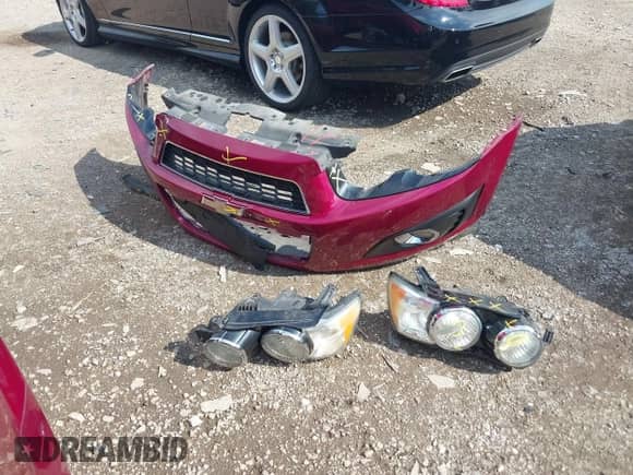 2014 Chevrolet Sonic LT z VIN 1G1JC5SB0E4109946, wystawiony jako IAAI lot #43021593 z przebiegiem 102 872 mil mil oraz . Historia ofert i sprzedaży dostępna na DreamBid. Obrazek 12.