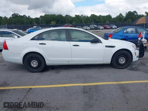 2014 Chevrolet Caprice Police Police with VIN 6G3NS5U27EL950499, listed as a IAAI auction lot 43005714 with 116,591 mi miles and . Bid and sale history available at DreamBid. Image 13.