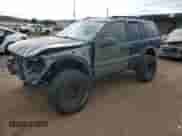 2002 Jeep Grand Cherokee Laredo with VIN 1J8GW48S82C159112, listed as a Copart auction lot 84000665 with 204,396 mi miles and Salvage title. Bid and sale history available at DreamBid. Image 1.