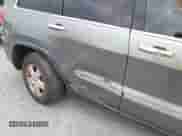 2012 Jeep Grand Cherokee Laredo with VIN 1C4RJFAG3CC272631, listed as a IAAI auction lot 43291923 with 168,220 mi miles and . Bid and sale history available at DreamBid. Image 6.