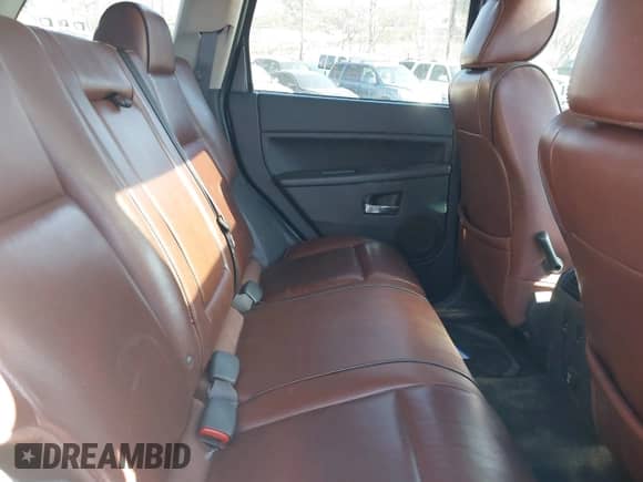 2009 Jeep Grand Cherokee with VIN 1J8HR68T39C540795, listed as a IAAI auction lot 41379112 with 236,624 mi miles and . Bid and sale history available at DreamBid. Image 8.