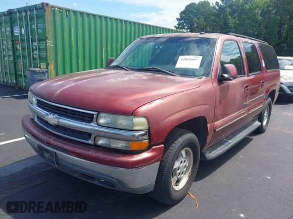 2003 Chevrolet Suburban LT z VIN 1GNEC16Z63J215591, wystawiony jako IAAI lot #42853057 z przebiegiem 292 607 mil mil oraz . Historia ofert i sprzedaży dostępna na DreamBid. Obrazek 2.