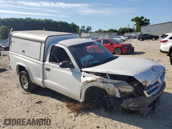 2004 Dodge Dakota with VIN 1D7FL16K14S554387, listed as a Copart auction lot 59397994 with Not provided miles and Salvage title. Bid and sale history available at DreamBid. Image 4.