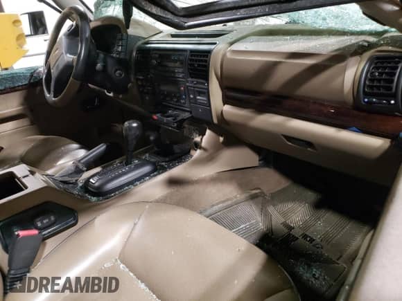 2000 Land Rover Discovery Cloth с VIN SALTY1246YA235948, выставлен на аукционе Copart как лот 70231385 с пробегом Не указан миль и Списание • Salvage title. История ставок и продаж доступна на DreamBid. Изображение 8.