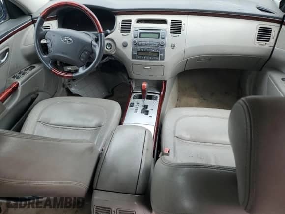 2006 Hyundai Azera SE z VIN KMHFC46F56A049763, wystawiony jako Copart lot #66331425 z przebiegiem Nie podano mil oraz Szkoda całkowita • Salvage title. Historia ofert i sprzedaży dostępna na DreamBid. Obrazek 8.