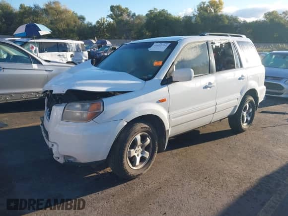 2007 Honda Pilot EX z VIN 2HKYF184X7H519875, wystawiony jako IAAI lot #43422713 z przebiegiem Nie podano mil oraz . Historia ofert i sprzedaży dostępna na DreamBid. Obrazek 2.