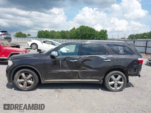 2013 Dodge Durango Citadel with VIN 1C4RDHEG3DC562477, listed as a IAAI auction lot 42645709 with 207,383 mi miles and . Bid and sale history available at DreamBid. Image 15.