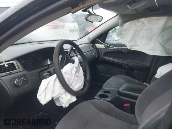 2009 Chevrolet Impala Police Police with VIN 2G1WS57M691253263, listed as a IAAI auction lot 41103398 with 144,247 mi miles and . Bid and sale history available at DreamBid. Image 5.