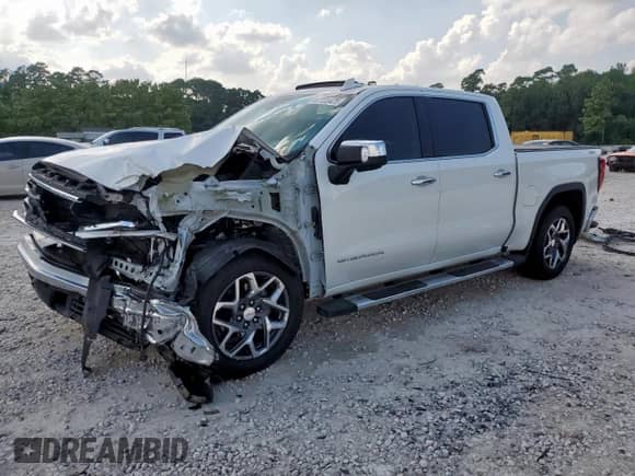 2022 GMC Sierra 1500 SLT with VIN 3GTUUDED4NG656603, listed as a Copart auction lot 67720425 with 28,215 mi miles and Salvage title. Bid and sale history available at DreamBid. Image 1.