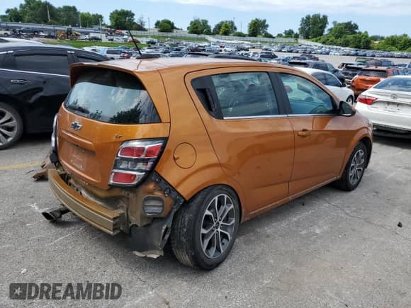 2018 Chevrolet Sonic LT with VIN 1G1JD6SH4J4118456, listed as a Copart auction lot 61079415 with 155,940 mi miles and Salvage title. Bid and sale history available at DreamBid. Image 3.