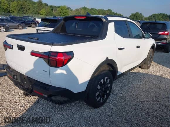 2025 Hyundai Santa Cruz SEL Activity z VIN 5NTJCDDE4SH138897, wystawiony jako IAAI lot #42972174 z przebiegiem 3 872 mil mil oraz . Historia ofert i sprzedaży dostępna na DreamBid. Obrazek 4.